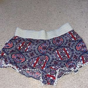 Multicolored shorts, super stretchy, size S but can definitely fit M